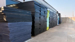 Industrial inventory of high expansion rate EVA foam sheets by Welle Trade stacked for wholesale distribution and manufacturing.